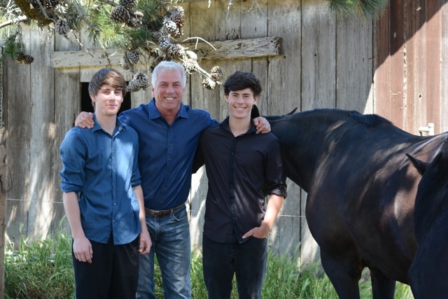William Ostrander with sons, Bruno, 19, left, and Jack, 16, right, and horses Cheetah and Raven