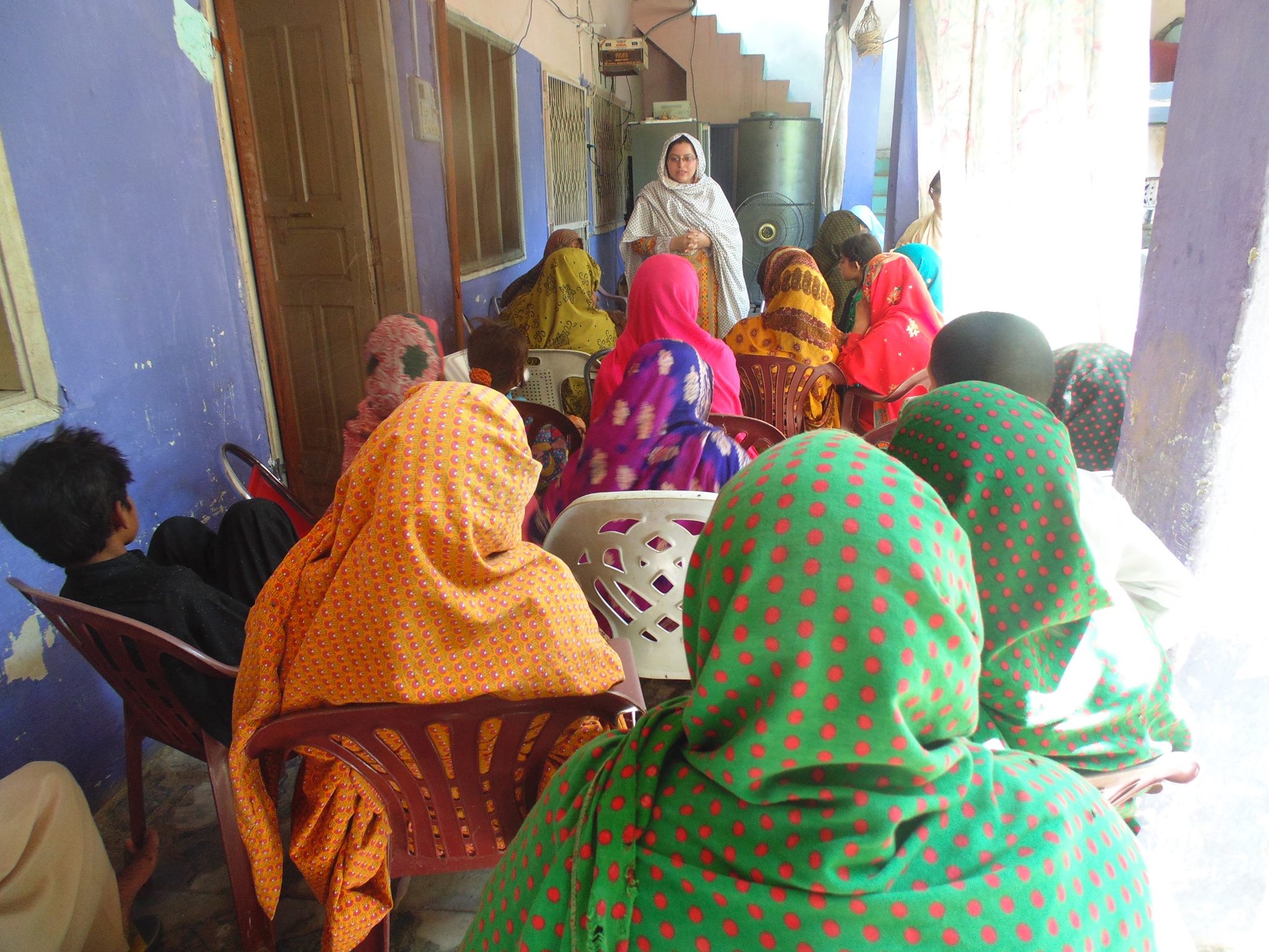 Saba Ismail speaking at a local community.