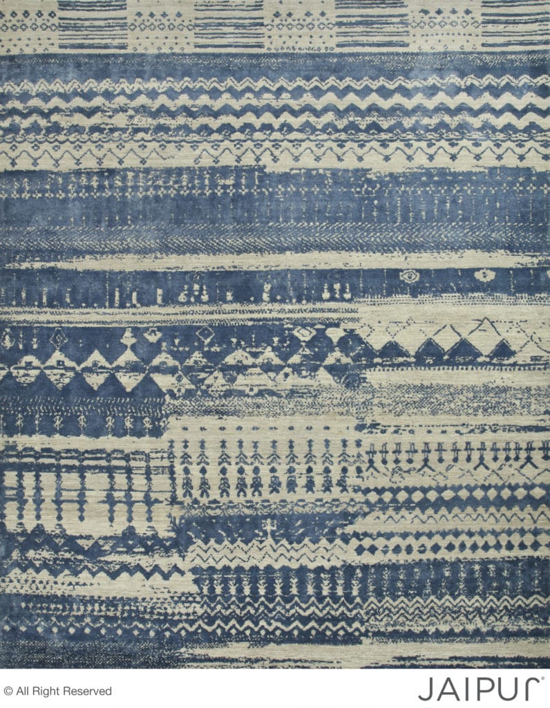 Anthar - Differences. The award-winning carpet. The carpet shows initial disagreement, that ends with a resolution on the top of the carpet as the patterns of the three weavers align.