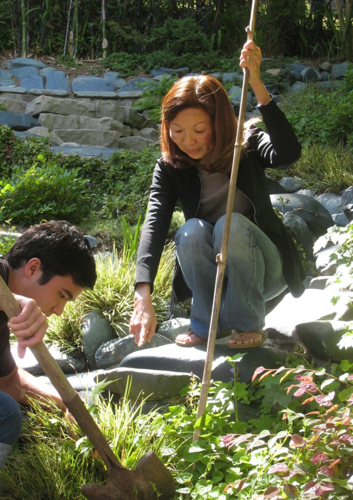 Teresa Law, co-founder and CFO of Mountain Hazelnuts, planting in Bhutan