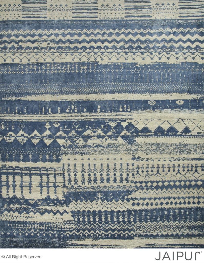 Anthar - Differences. The award-winning carpet. The carpet shows initial disagreement, that ends with a resolution on the top of the carpet as the patterns of the three weavers align. 