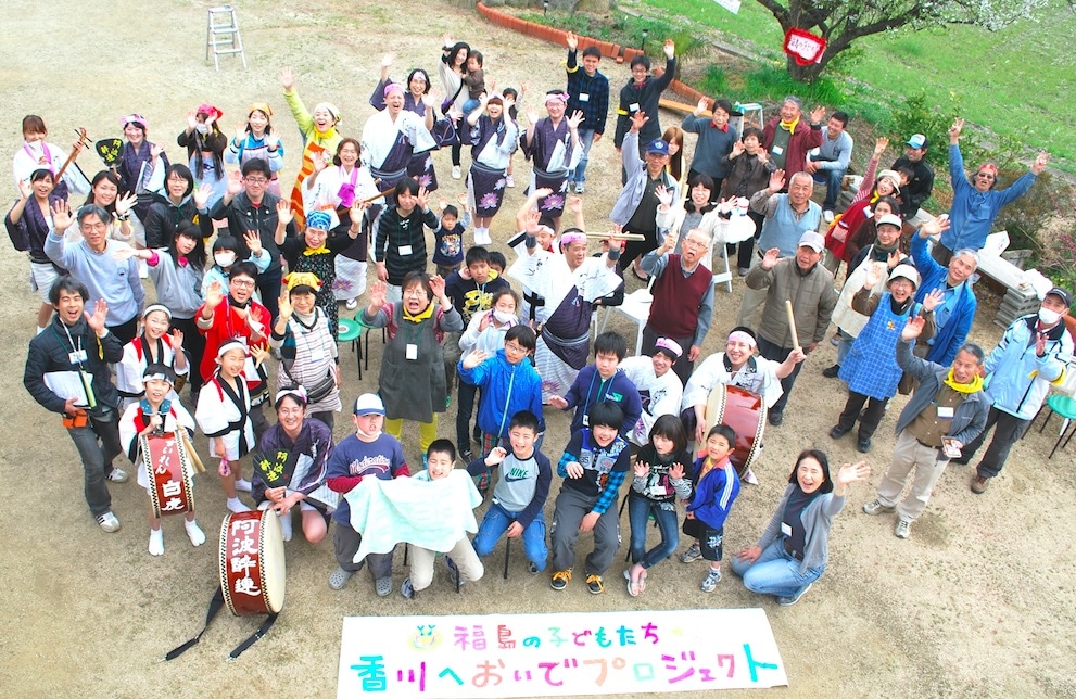 Satoko Watanabe and volunteers welcome Fukushima children and their mothers for a spring camp. 